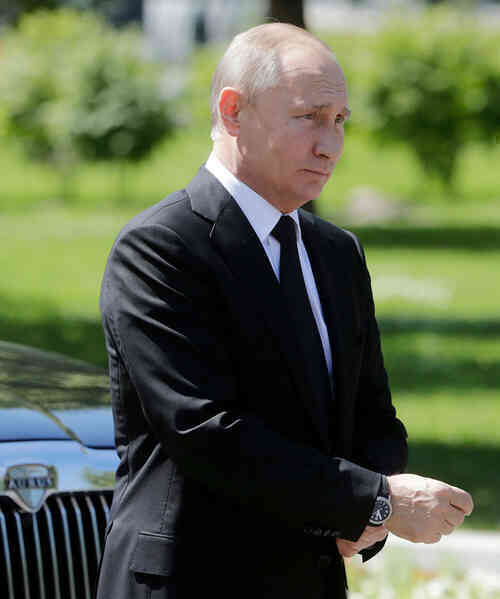 Cách đeo đồng hồ khác biệt của Tổng thống Nga Putin từng gây chú ý- Ảnh 2.