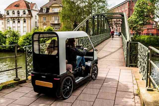 Xe điện tốc độ thấp, được coi là phương tiện dành cho người già ở Trung Quốc, nhưng lại đang trở thành xu hướng di chuyển mới tại châu Âu!- Ảnh 3.